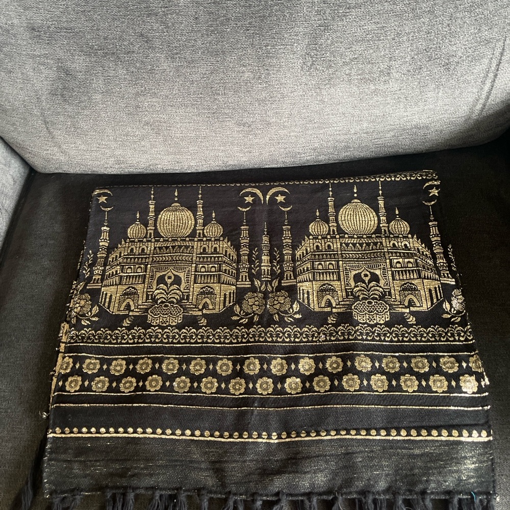 Black and Gold Tapestry with Architectural Design